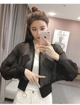 Chaqueta básica fina de lúrex transparente y suelta